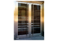प्राकृतिक लकड़ी अनाज आकार के साथ फैशनेबल स्टेनलेस स्टील आवासीय दरवाजे आपूर्तिकर्ता